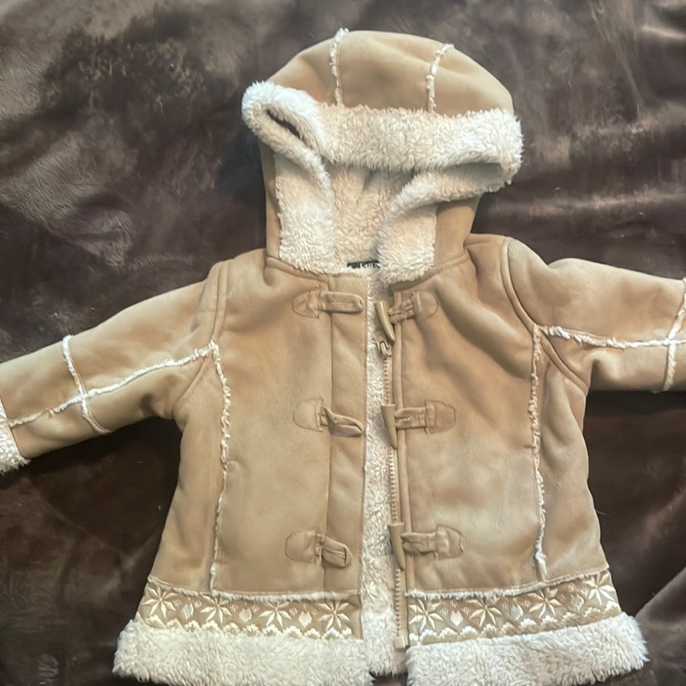 George Girls Coat with hood. Size runs from 6 to 12 months